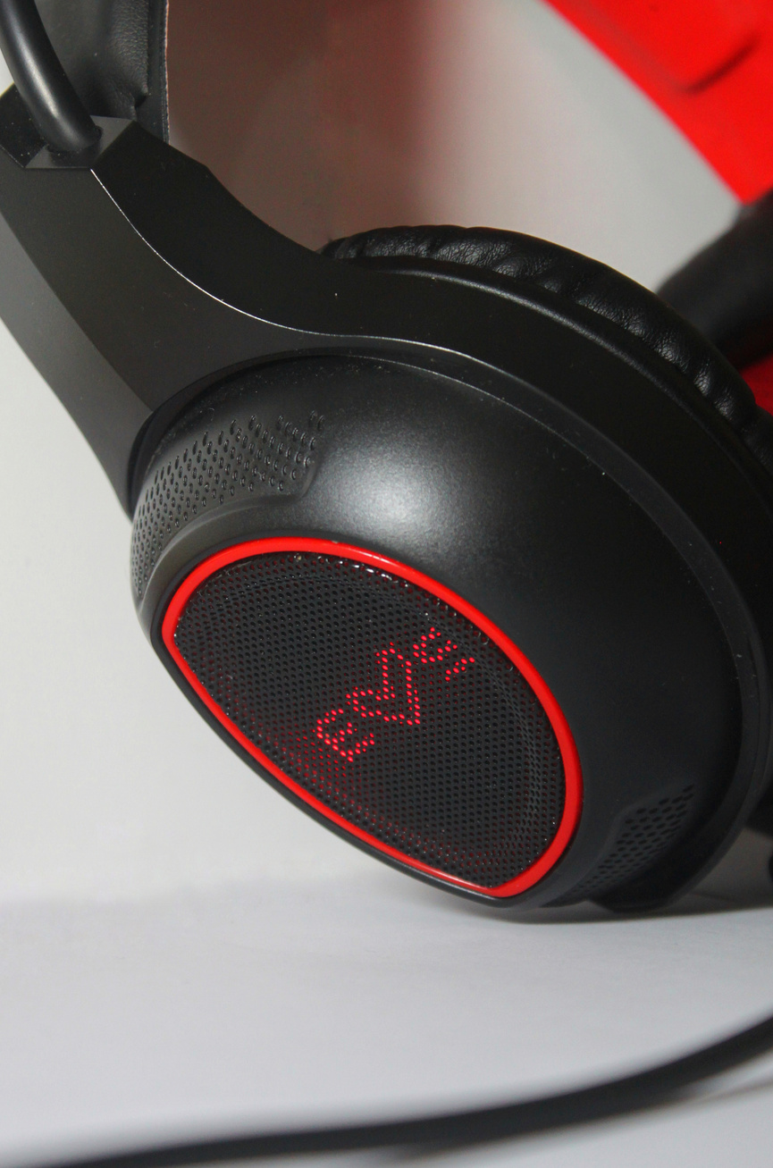 A product photograph by a UGC Creator of a pair of red and black headphones