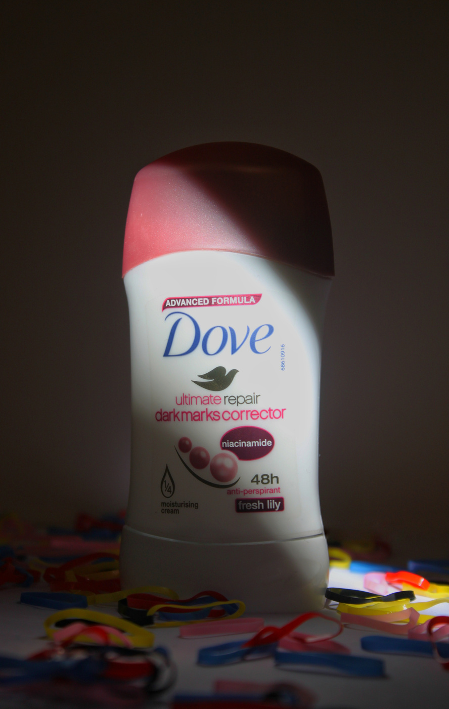 A product photograph by a UGC Creator of a bottle of dove deodorant.